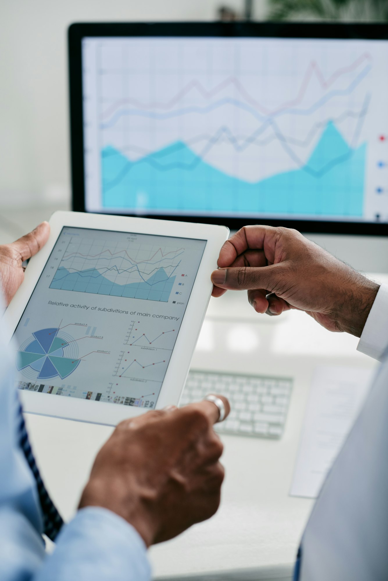 Entrepreneurs discussing financial chart